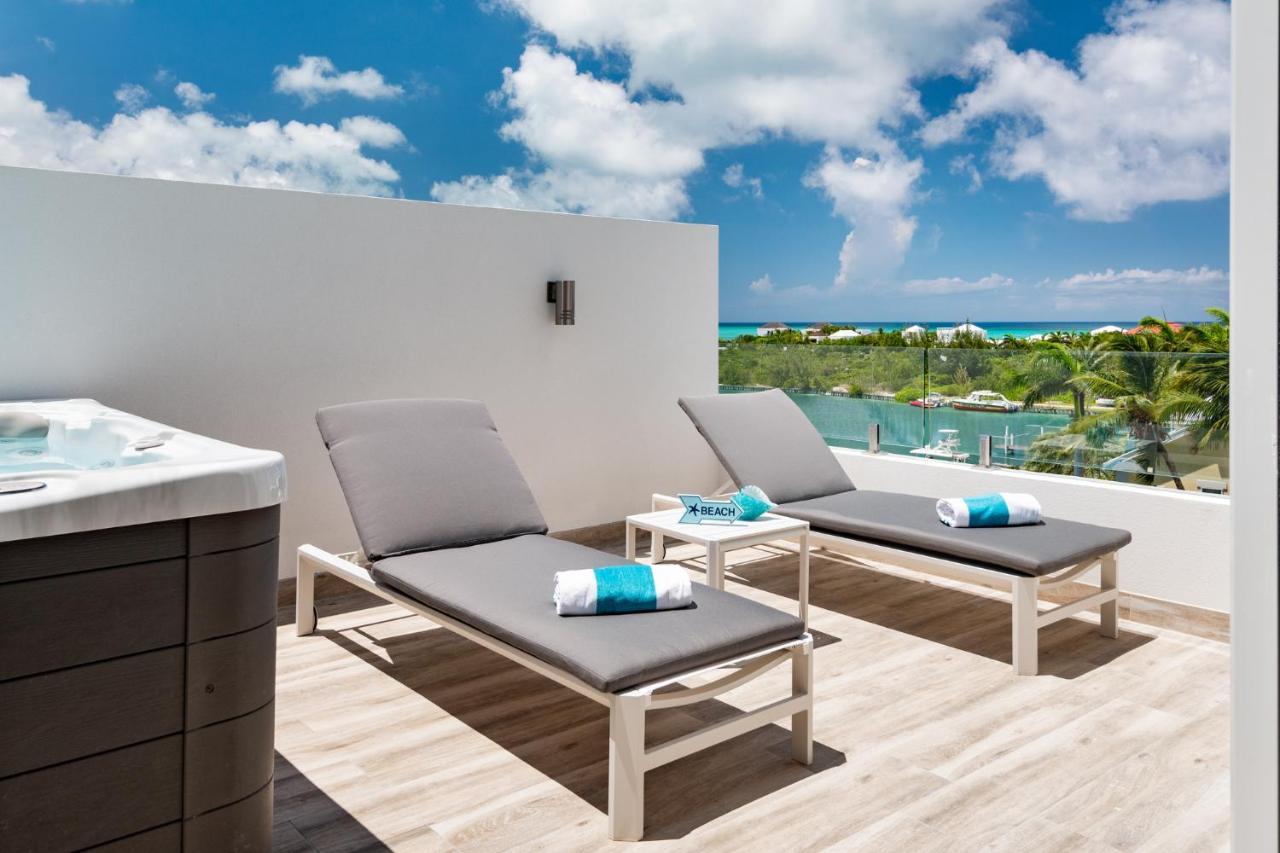 Zenza Boutique Hotel Turtle Cove ภายนอก รูปภาพ