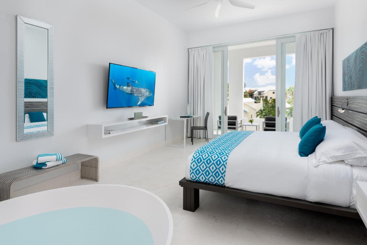 Zenza Boutique Hotel Turtle Cove ภายนอก รูปภาพ